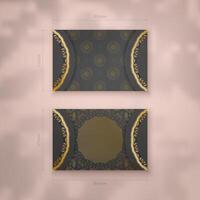 Black business card template with Greek gold pattern for your contacts. vector