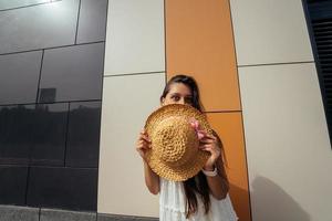 Cute young woman laughing at the camera photo