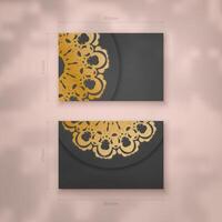 Business visiting card template in black color with mandala gold pattern for your contacts. vector