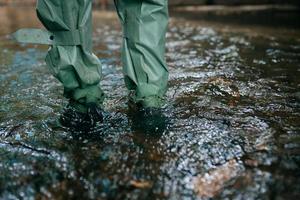 Close up view of waterproof pants boots photo