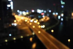 City lights blurred blur bokeh. City blur bokeh background. Black city scape background. photo