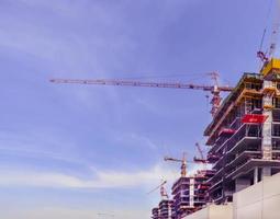 Dubai, UAE December 25 2018 Construction site on blue background. Skyline, cityscape. Urban cityscape. Building machineryon sky blue background. United arab emirates. photo