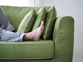 Afternoon nap on a green sofa photo