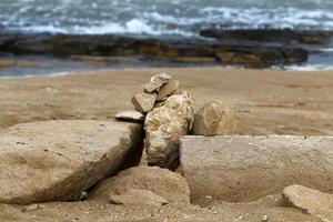 Stones in a city park by the sea in northern Israel photo