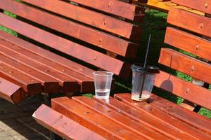 A non-alcoholic soft drink is poured into a glass. photo