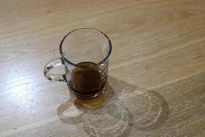 A non-alcoholic soft drink is poured into a glass. photo