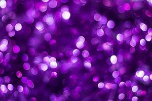 Purple shiny glitter holiday beautiful abstract blur bokeh background photo