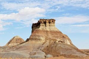 Small Butte With Many Layers In Southwest High Desert photo