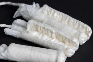 Sewn cotton wool for use as tampons photo
