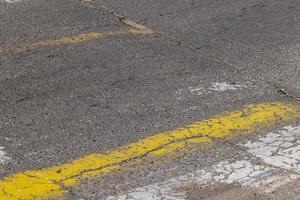 Old drawings of a pedestrian crossing on the highway photo