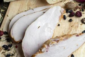 Smoked chicken breast with spices photo