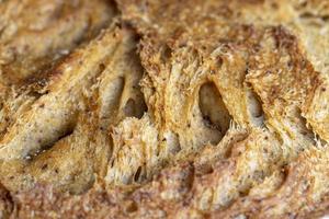 Dark wheat loaf of bread photo