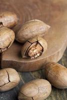 Pecan in a shell on the table photo