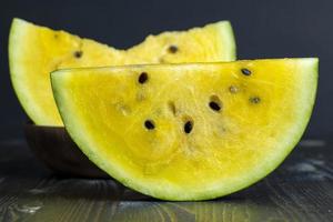 slices of sweet yellow watermelon photo