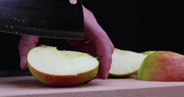 Sliced ripe apple on a cutting board photo