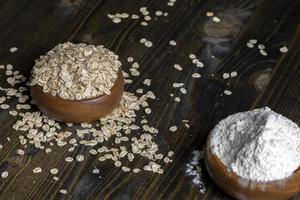 Wheat flour from a wooden bowl photo