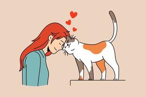 amantes de las mascotas domésticas y el concepto de persona gato. una chica pelirroja sonriente parada y apoyada en un gatito gato amoroso con la cabeza sintiéndose enamorada de la ilustración vectorial vector