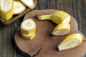 Sliced ripe yellow banana, close up photo