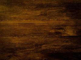 uso de textura de madera oscura como fondo natural con espacio de copia para obras de arte. vista superior foto