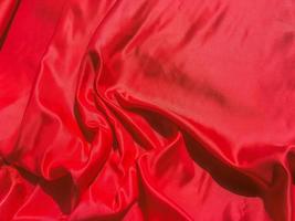 Red fabric texture for backgroundwith coy space. Valentines Day or Christmas Day wallpaper design photo