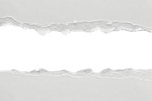 White ripped paper torn edges strips isolated on white background photo