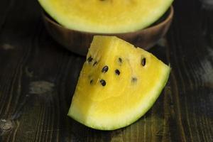 slices of sweet yellow watermelon photo