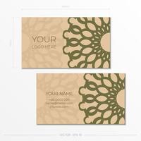 Template for print design of business cards in beige color with luxurious patterns. Preparing a business card with a place for your text and an abstract ornament. vector