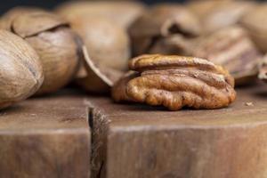 Pecan in a shell on the table photo