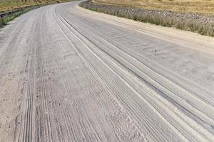 Rural road for cars and transport photo