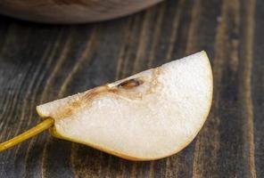 Sliced pear on the table photo