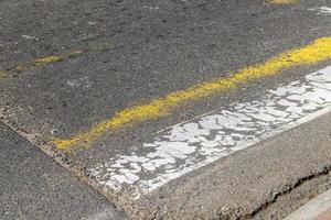 Old drawings of a pedestrian crossing on the highway photo