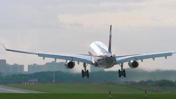 MOSCOW, RUSSIAN FEDERATION SEPTEMBER 12, 2020 - Aeroflot Airbus 330 VQ BQY landing, sunset backlit, Sheremetyevo International airport, SVO UUEE video