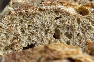 Dark wheat loaf of bread photo