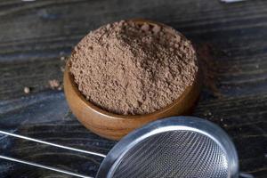 crumbly powder from cocoa beans photo