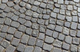 part of the road made of concrete tiles photo