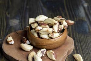 Peeled Brazil nuts on the table photo