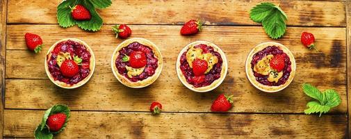 Summer tartlets with strawberries photo