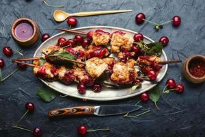 Chicken breast kebab with berry marinade photo