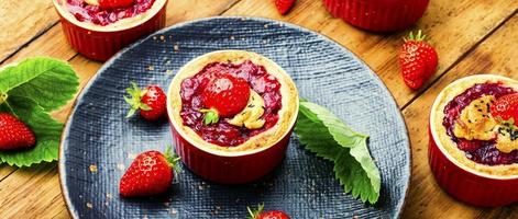Summer tartlets with strawberries photo