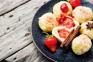 Sweet dumplings with strawberries or knedlik photo
