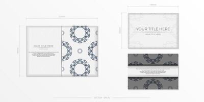 A set of business cards with a blue and white pattern vector