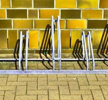 Detailed view at a colorful old and weathered brick wall texture as a panoramic background. photo