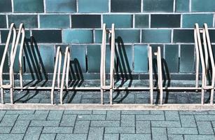 Detailed view at a colorful old and weathered brick wall texture as a panoramic background. photo