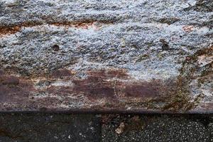 Close up of granite and rusty mixed textures and materials in high resolution photo