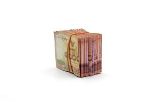 isolated batch of Thai banknotes on white photo