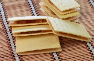 pineapple stuffed crackers on bamboo mat photo