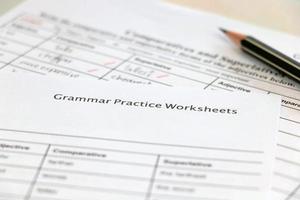 English grammar practice sheet with handwriting photo