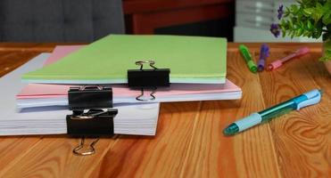 office supplies and document on table photo