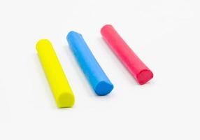 primary color of clay sticks on white photo