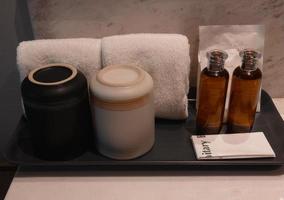 bath kit on ceramic tray in hotel room photo